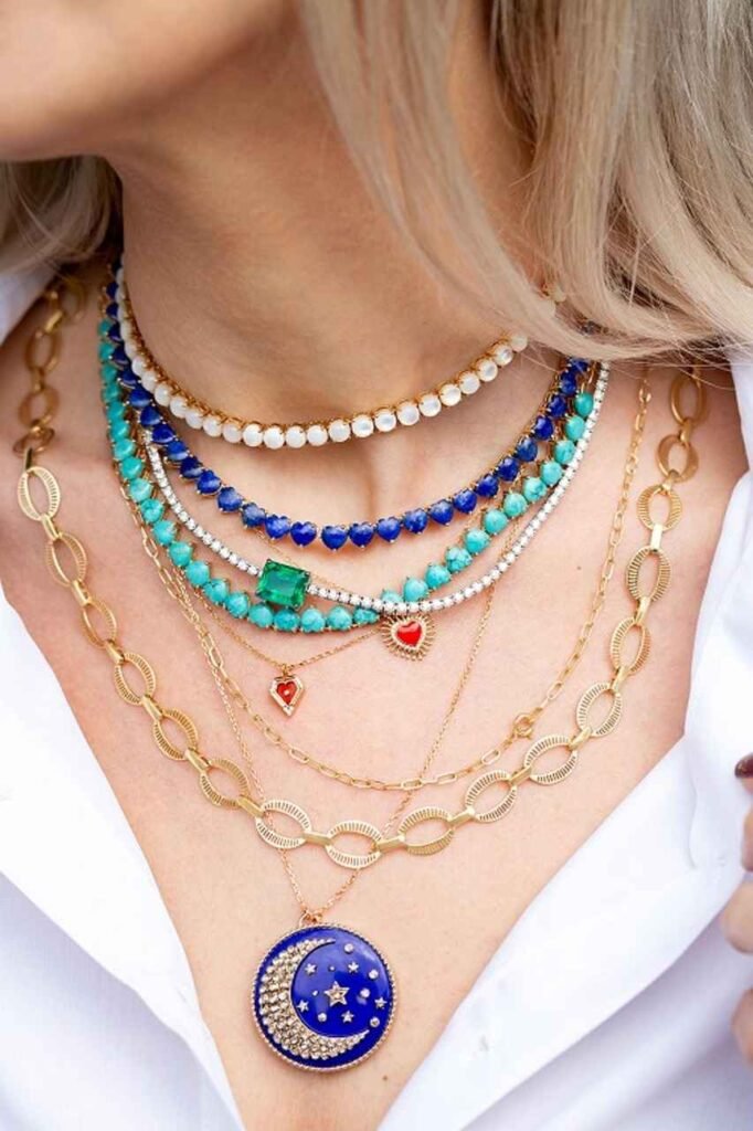 layered necklaces with blue, white and light green chains